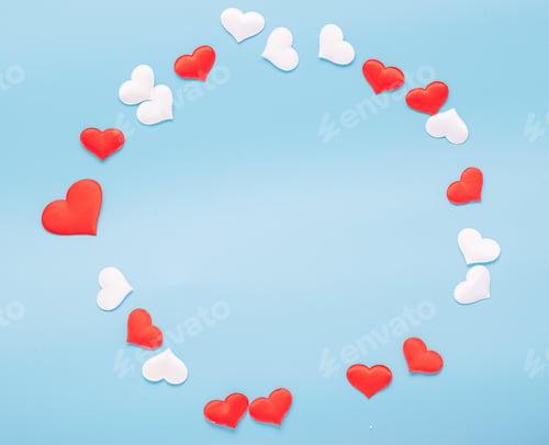 Preview: Red hearts symbol of love lined with a square frame on blue background