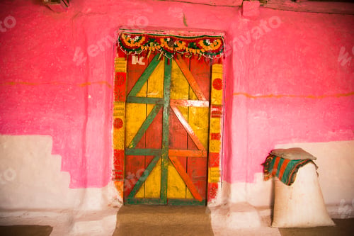Preview: Colorful wooden door of rural house, India.