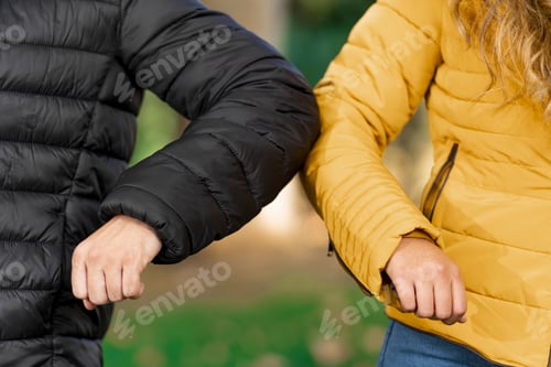 Preview: Friends greeting each other with elbows