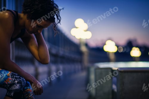 Preview: Jogger taking break on bridge, Arroyo Seco Park, Pasadena, California, USA