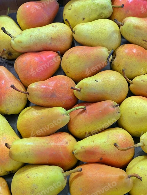 Preview: Top view of sweet juicy organic fresh ripe pears for sale at a local farmers market