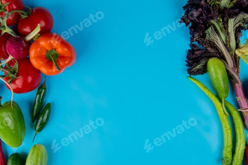 Preview: top view of fresh vegetables ripe tomatoes colorful bell peppers cucumbers green chili peppers