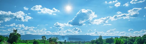 Preview: Beautiful blue sky with white clouds and sunlight