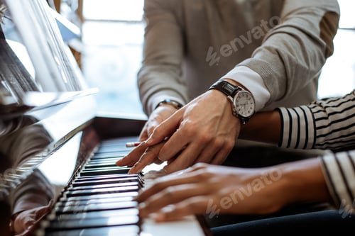 Preview: Woman learning to play piano