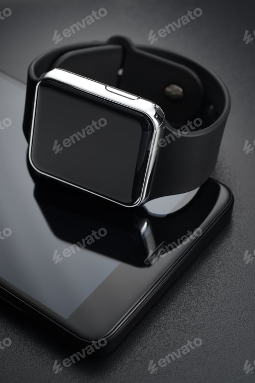 Preview: Black smart wrist watches and smartphone