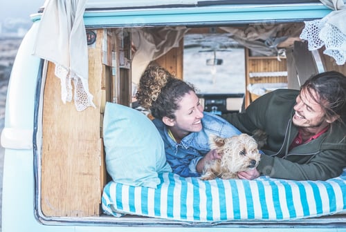 Preview: Happy couple camping during alternative vacation