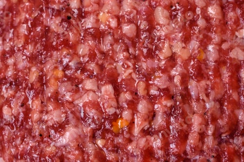 Preview: Fresh raw ground beef burger patty with salt and spices