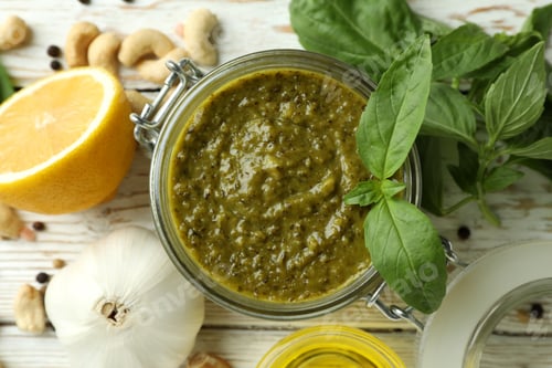 Preview: Pesto sauce and ingredients for cooking on wooden background