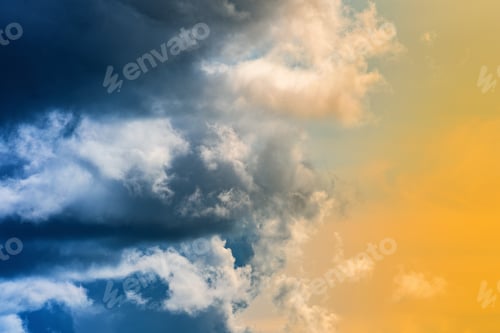 Preview: Dramatic Blue Thunderclouds, Stunning Yellow-Golden Fluffy Clouds Illuminated by Rays of Sun