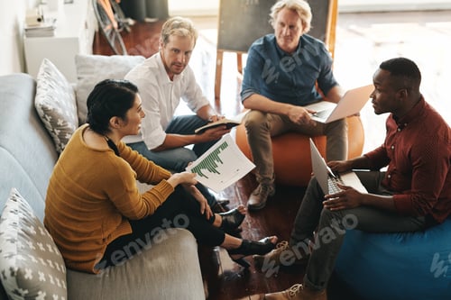 Preview: Shot of a diverse group of designers brainstorming together in an office