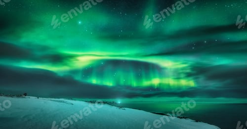Preview: Aurora borealis over ocean. Northern lights in Teriberka, Russia