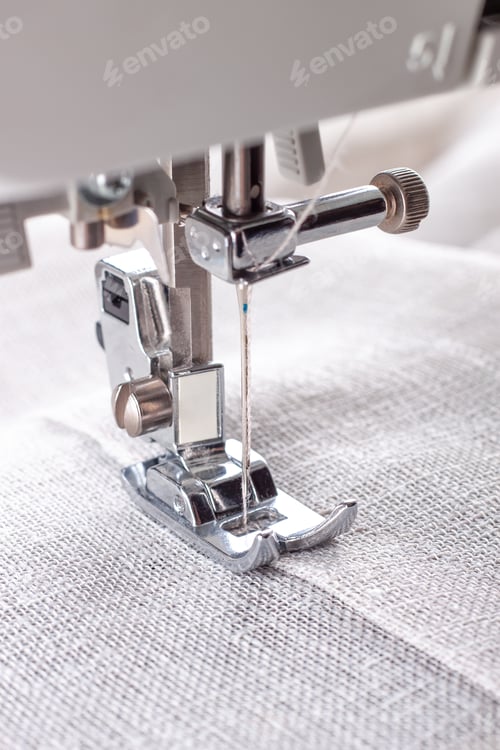 Preview: Modern Sewing Machine Presser Foot and Item of Clothes. Sewing Process, Handmade, Hobby, Business