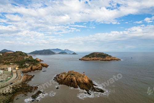 Preview: View of picturesque rocky islands situated in a beautiful body of water