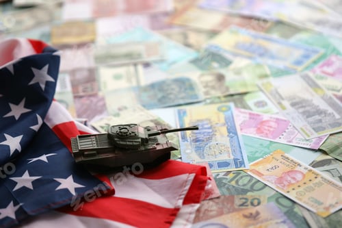 Preview: Tank on United States flag on many banknotes of different currency. Background of war funding