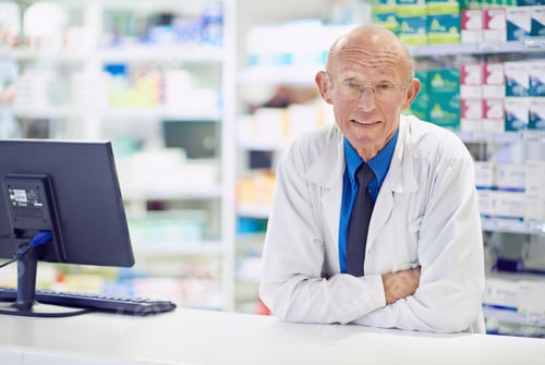 Preview: Ive seen a lot of remedies come and go...Portrait of a senior pharmacist working at a counter.