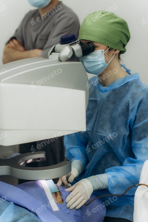 Preview: Surgeon performing laser eye surgery procedure on patient
