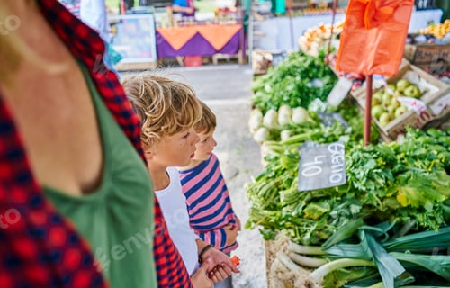 Preview: Mother and sons shopping at fruit and veg stall at market, Montevideo, Uruguay, South America