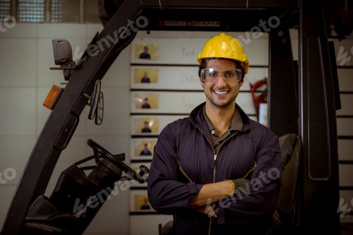 Preview: Portrait worker industry factory wear safety uniform factory drive a forklift car and open car light