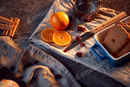 Preview: Close Up Of Sliced Oranges With Cranberries And Cinnamon Stick To Decorate Christmas Food