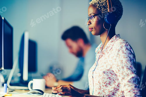 Preview: Portait of software designer working in office