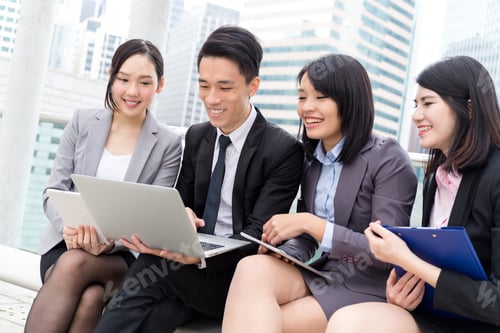 Preview: Business people working at outdoor