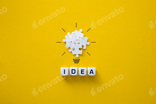 Preview: Light bulb from puzzles on yellow background.