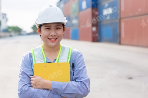 Preview: Portrait Happy Asian women young teen Customs worker in logistic industry. Port officer working