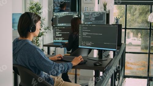 Preview: Junior developer programming code on terminal window, typing server information