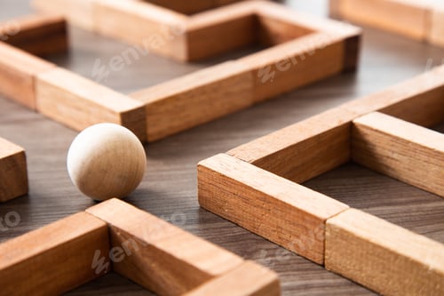 Preview: concept photo of standing in a maze and looking for the best way or solution