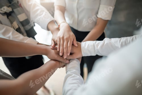 Preview: Business people at meeting showed the power and unity of working together teamwork.