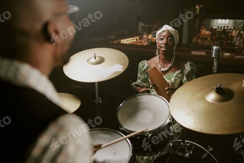 Preview: Woman Singing In Front Of Male Drummer