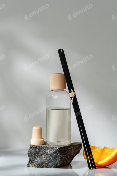 Preview: Aromatic Reed Diffuser on a Stone Base With Orange Slice Accent