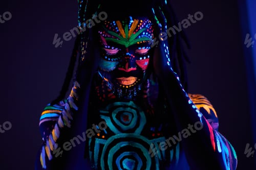 Preview: man with fluorescent body art suffer from headache