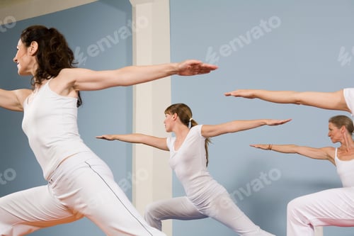 Preview: Three women practising yoga