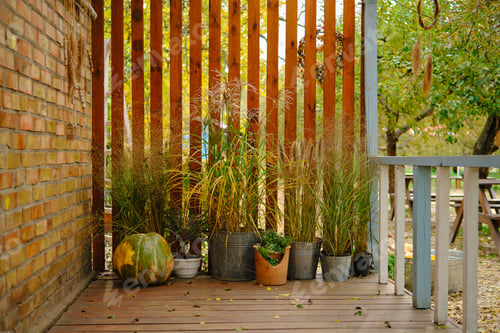 Preview: Autumn decor on the porch of the house.