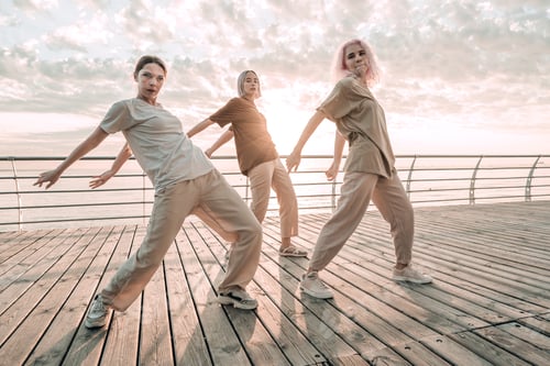 Preview: Dancing group of young talented freak women performing freestyle hip-hop moves. females enjoying mod