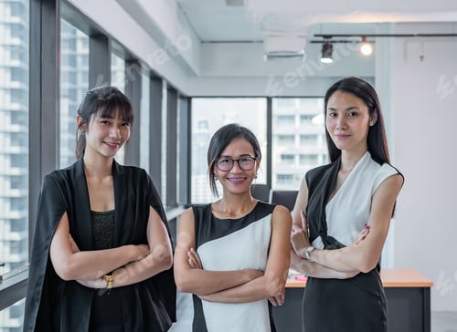 Preview: Portrait of women in modern business office,look to camera