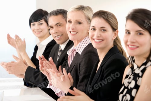 Preview: A line of business people clapping
