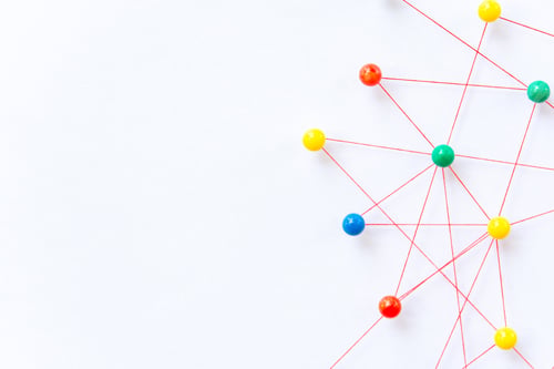 Preview: The connection between the two networks. Network simulation on paper linked together by yarn