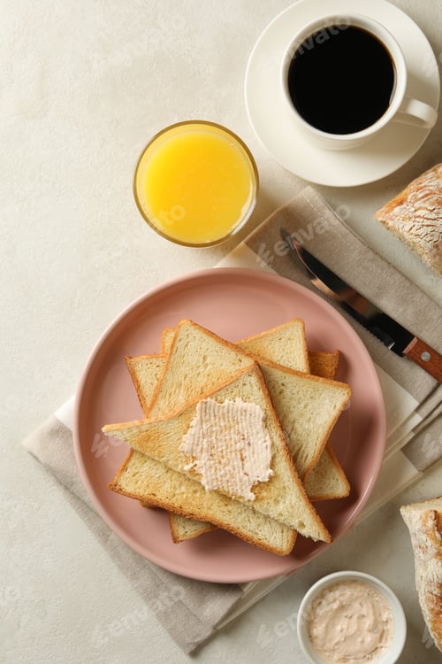 Preview: Concept of cooking toasts on white table