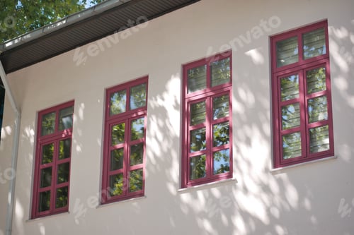 Preview: Close up of colorful buildings with modern window