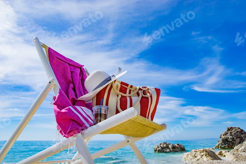 Preview: beach with deck chair, towel, bag, hat