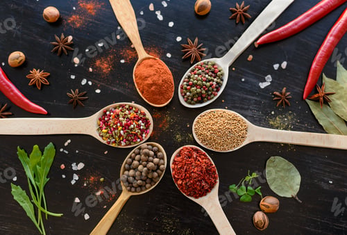Preview: Spices and herbs on old kitchen table