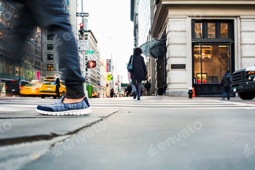 Preview: Car on street in traffic by buildings in city