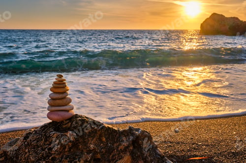 Preview: Concept of balance and harmony - stone stack on the beach