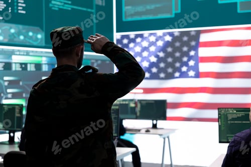 Preview: United States army soldier presenting his salute in government monitoring room