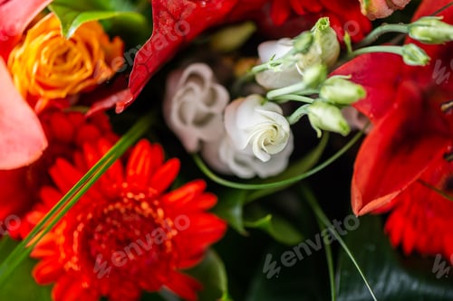Preview: Vibrant Bouquet of orange Asiatic lilies and other flowers