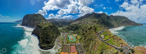 Preview: Madeira coast, green lush hills and Atlantic Ocean. Aerial drone view