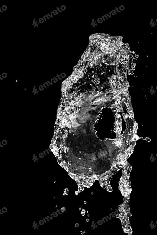 Preview: Splashing water in front of black background