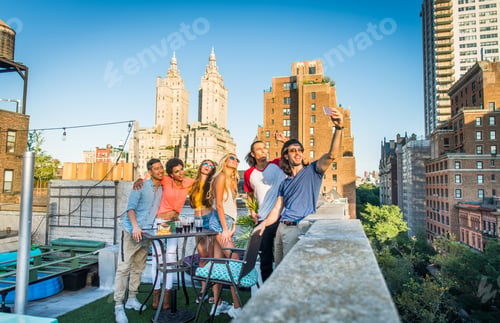 Preview: Group of friends having party on a rooftop